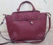 Стильная и практичная сумка carpisa цвета бордо
