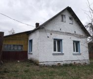Кирпичный дом со стеклопакетами пригодный для жизн
