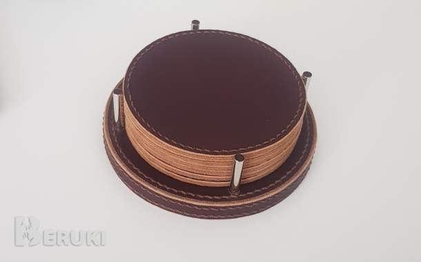 Набор кожаных бирдекелей (костеров) на подставке. 1