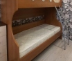 Продам недорого кровать двухъярусную с матрасами
