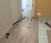 укладка ламината/монтаж плинтуса