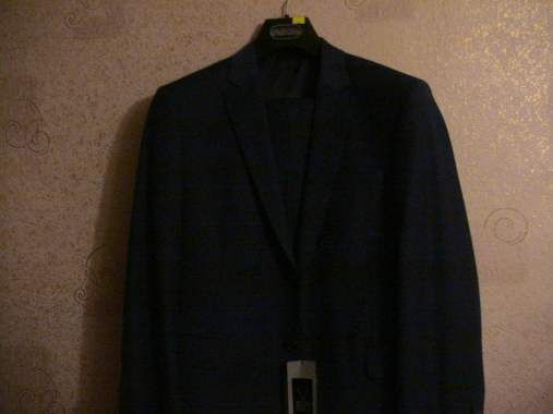 Продаю новый мужской костюм 0