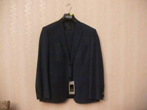 Продаю новый мужской костюм 2