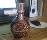 Пустая бутылка от бальзама